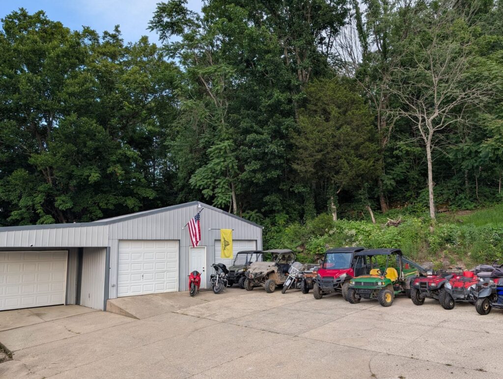 Dodge's Powersports shop building in Carthage, TN with ATVs, side-by-sides and motorcycles lined up outside